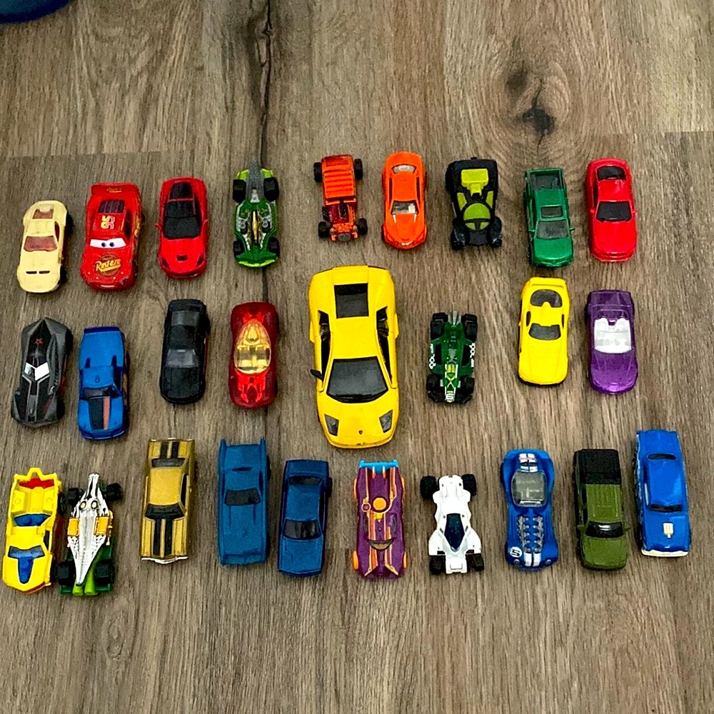 27 Hot Wheels and hot wheel’s like cars.